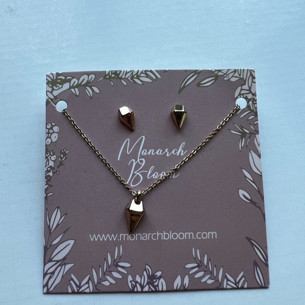Monarch Bloom gold earrings and necklace matching set.